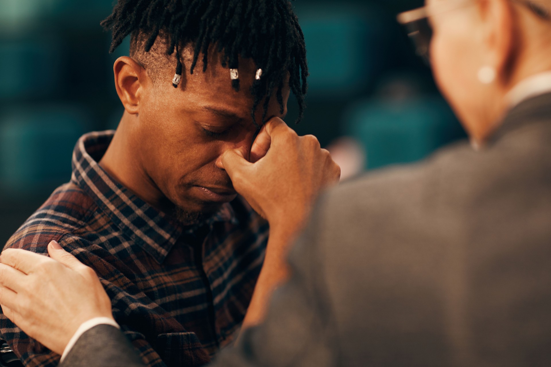 Sad African man crying